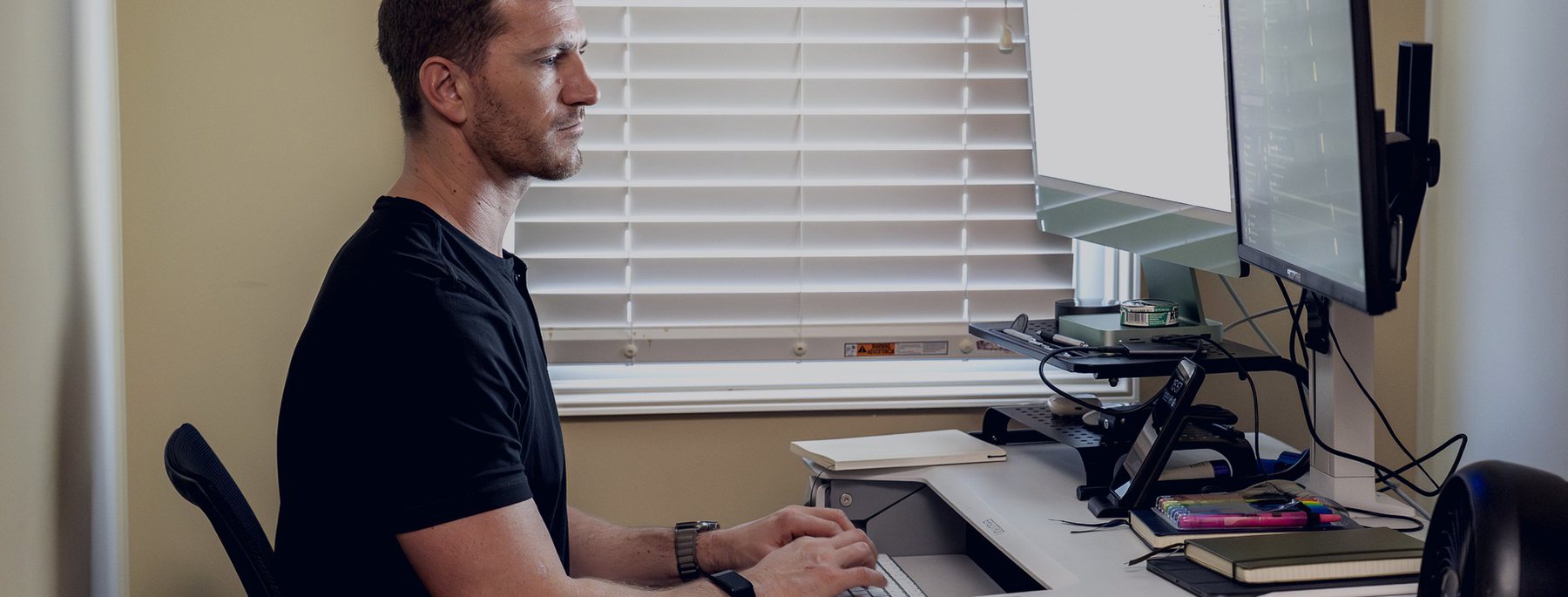 Dr. Jay Wiles at his workstation reviewing recordings